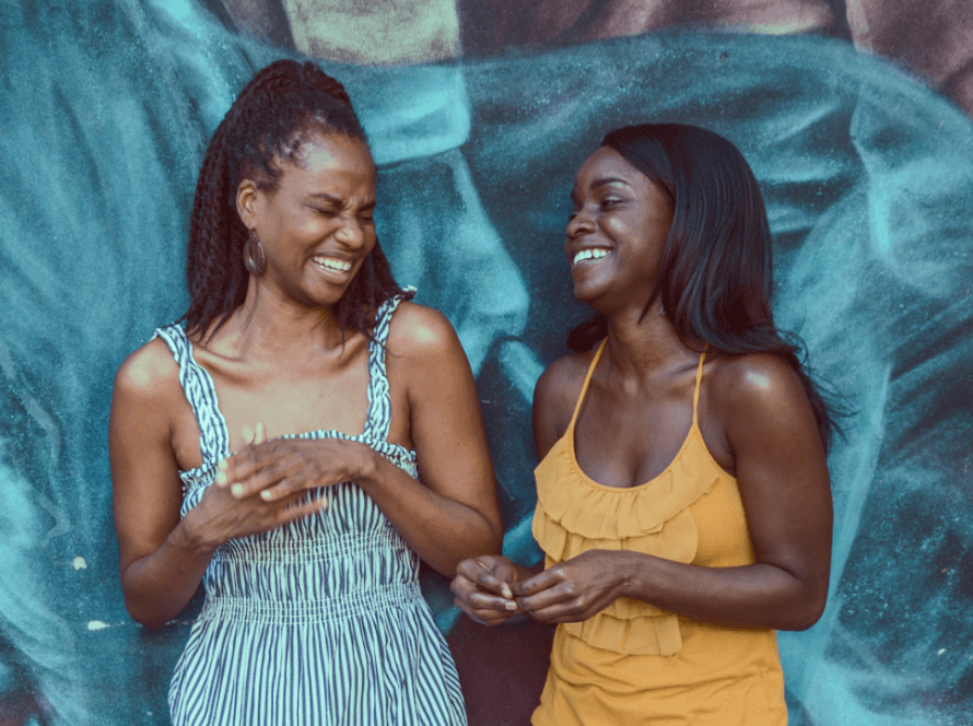 2 Black women laughing