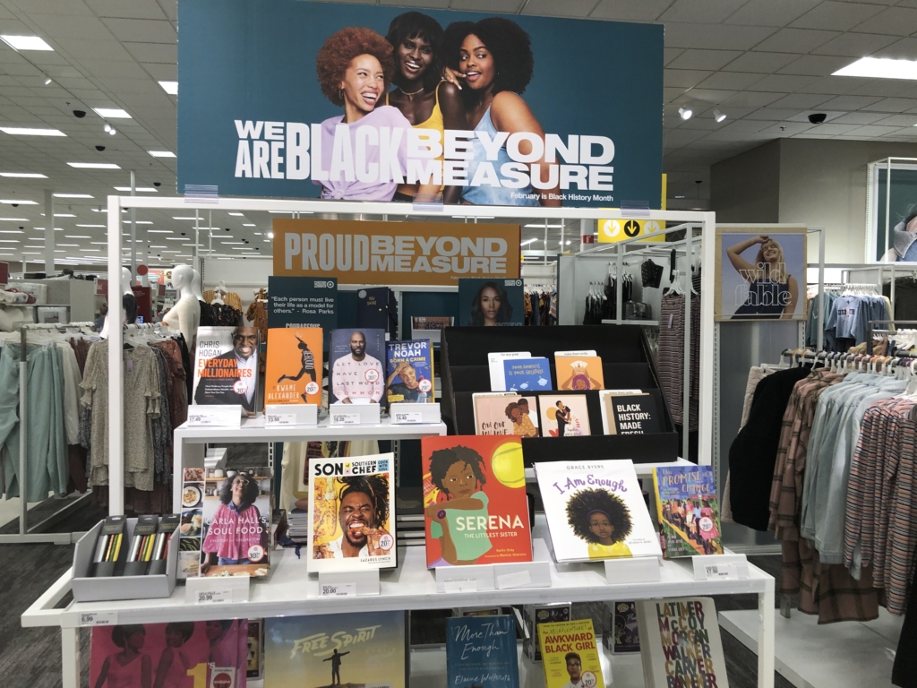 Black History Month campaign display at Target featuring books, a banner, and other merchandise